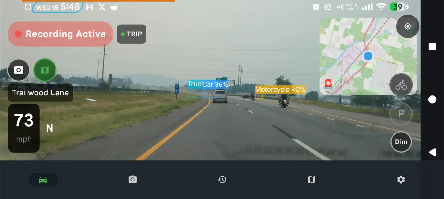 DriveSight drive screen at 73 mph with AI detection boxes on a truck, a car and a motorcycle